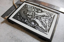 Load image into Gallery viewer, Men an Tol, playful hares Lino print, framed
